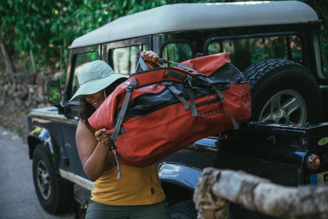 FORCLAZ - Waterproof Trekking Carry Bag - 80 L to 120 L - DUFFEL 900 EXTEND WP, Brick red