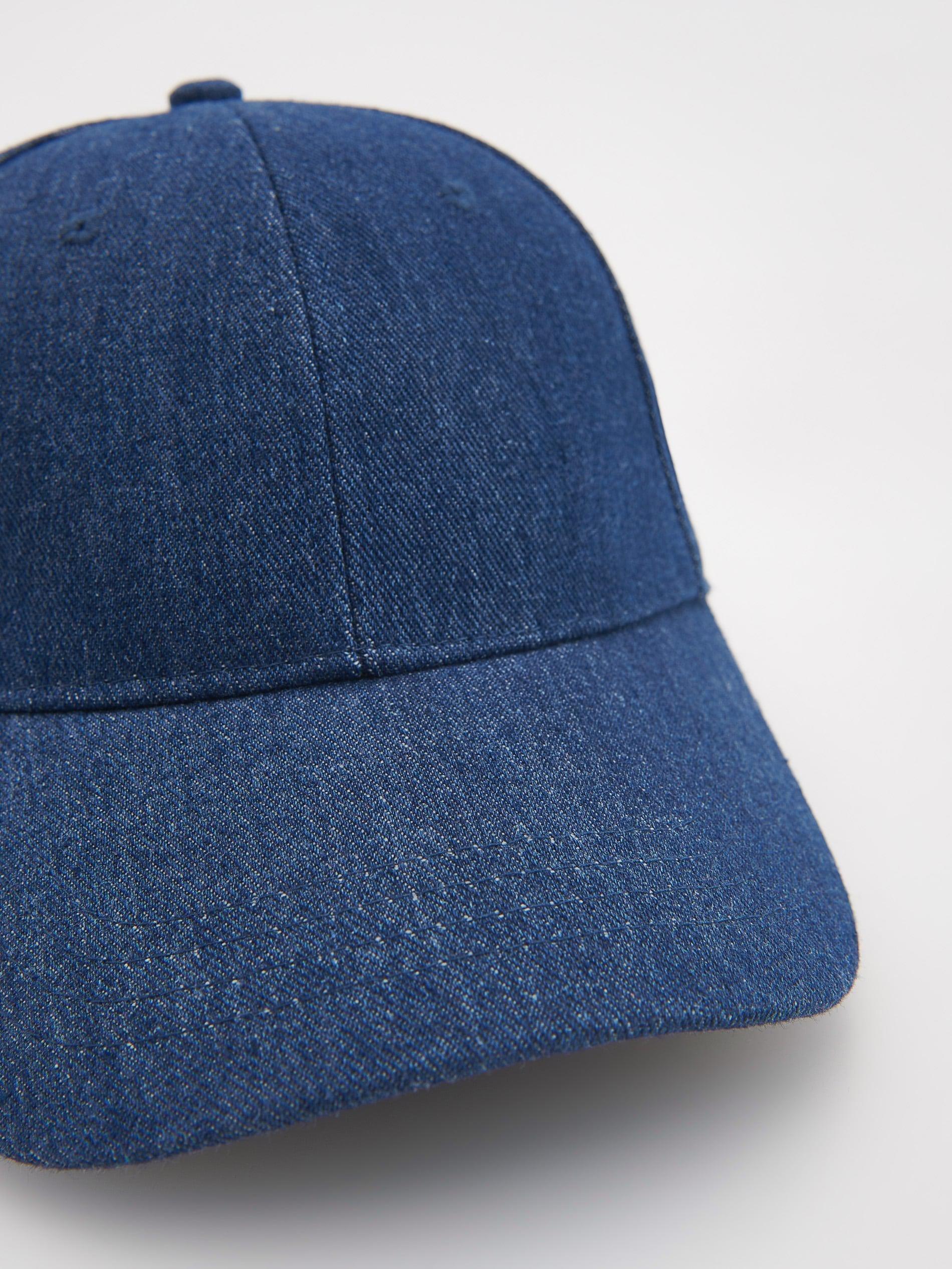 Reserved Navy Cap Azadea UAE