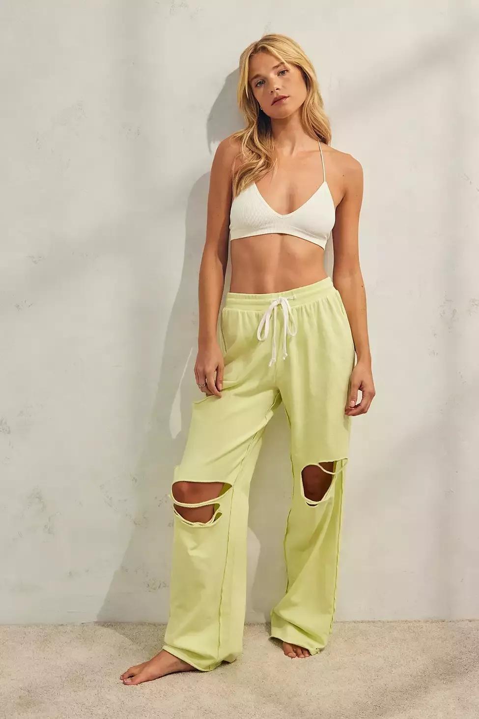 Torn on sale track pants