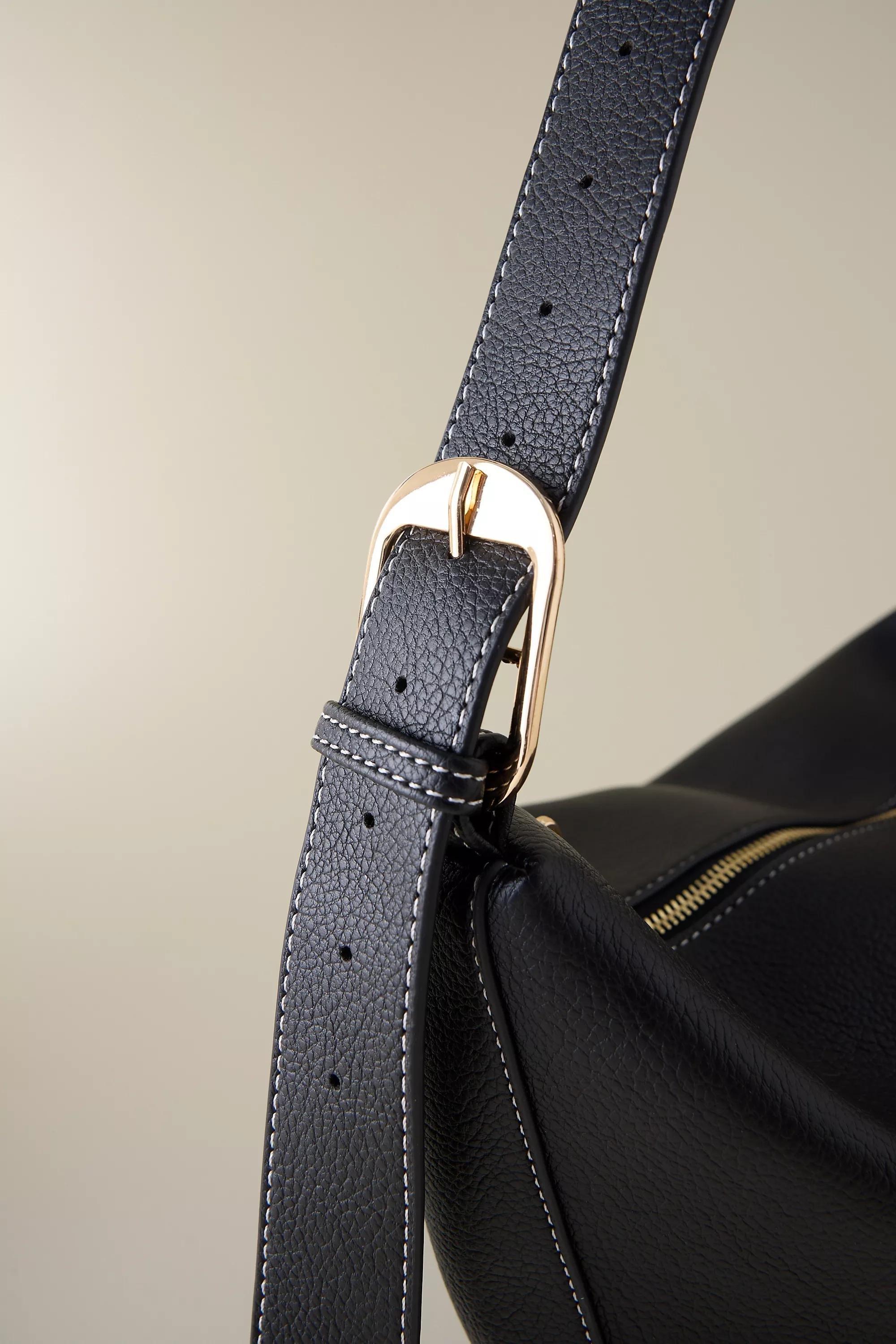 BLACK Polished Pebble Sling Bag, A501_0001, large image number 1