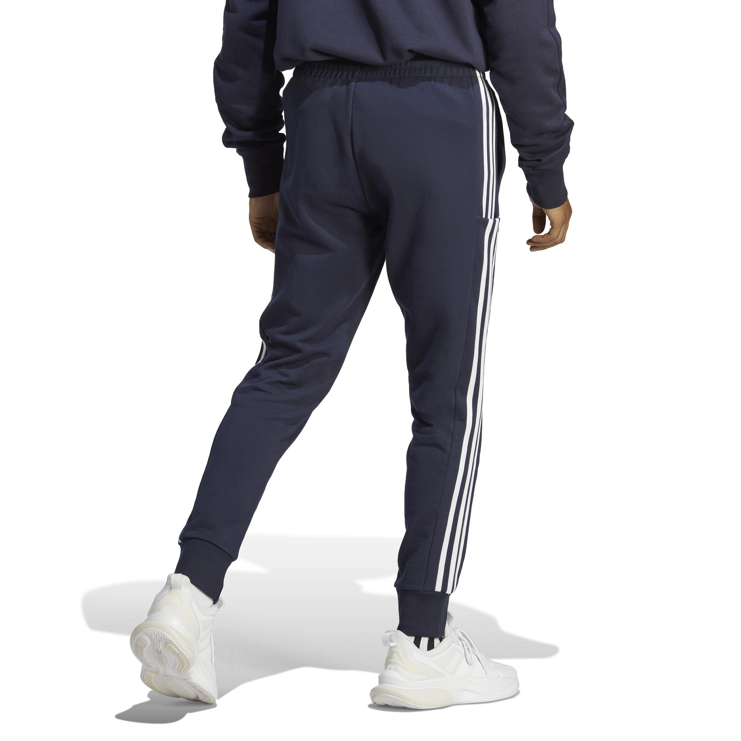 Grey adidas joggers with blue stripes cheap