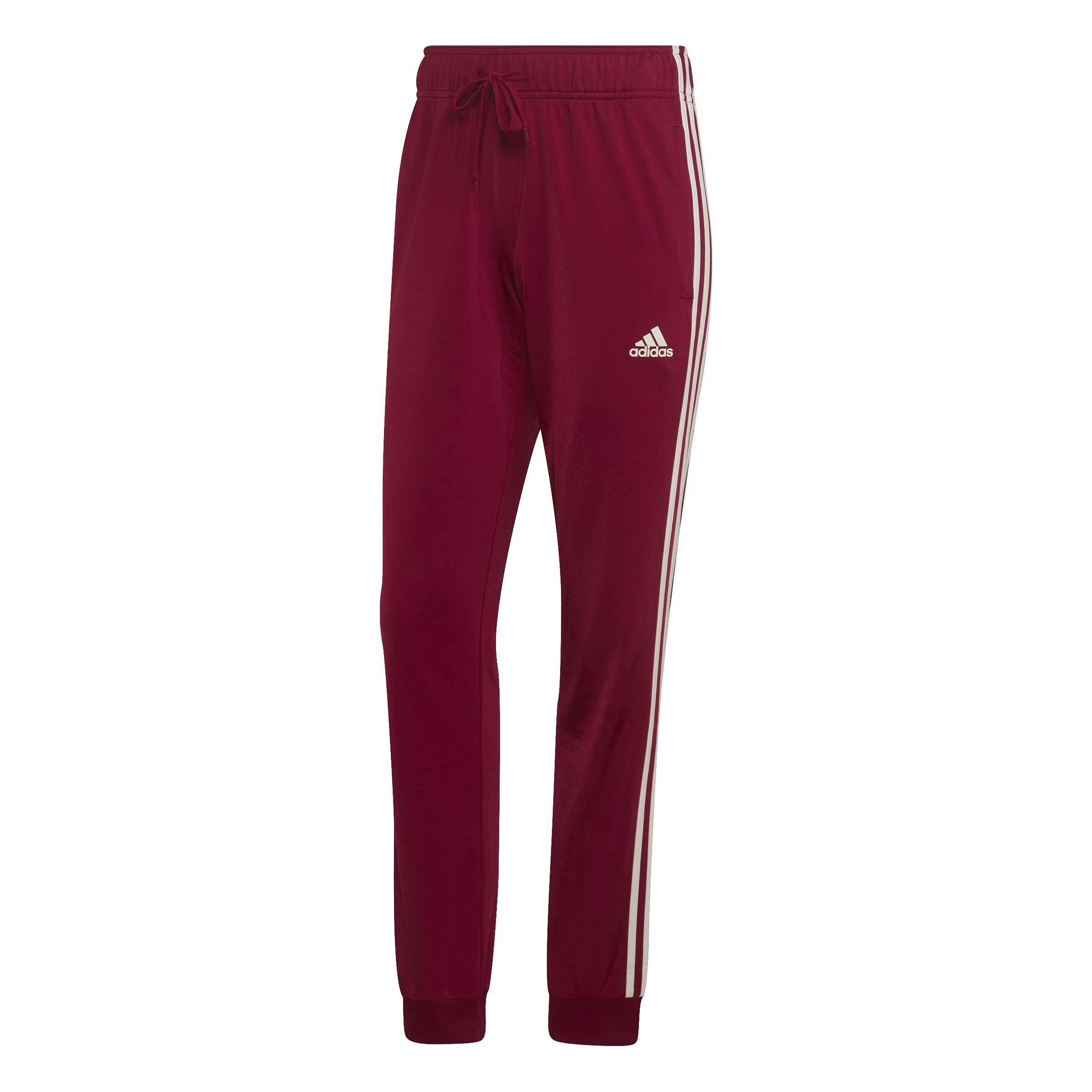 Shop Primegreen Essentials Warm-Up Slim Tapered 3-Stripes Tracksuit Bottoms  by adidas online in Qatar