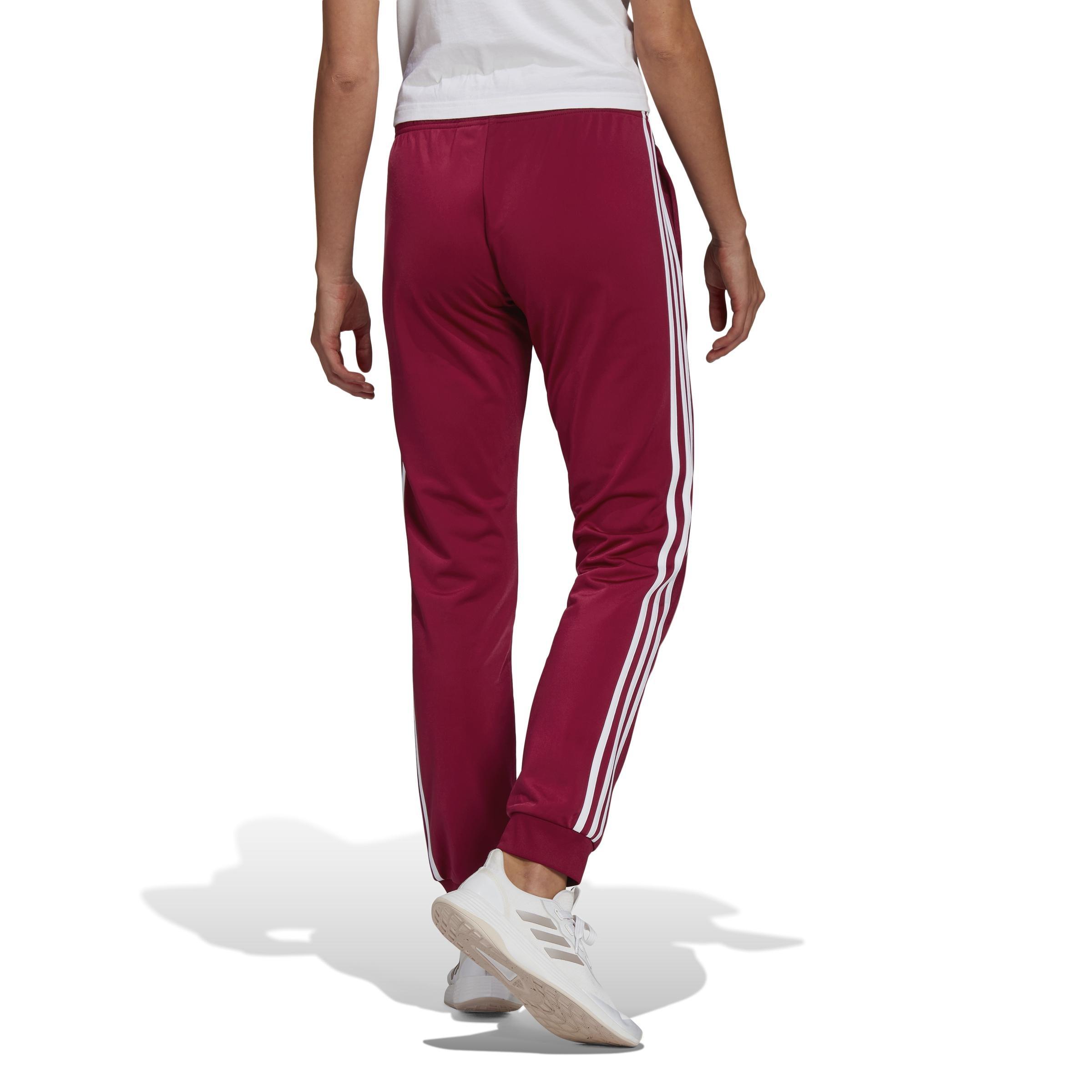 Shop Primegreen Essentials Warm-Up Slim Tapered 3-Stripes Tracksuit Bottoms  by adidas online in Qatar