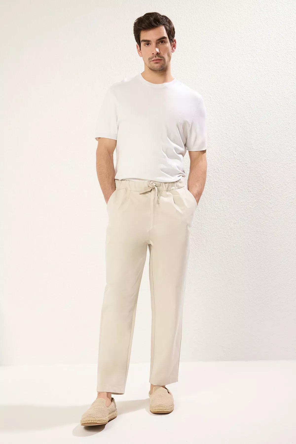 Beige Tapered Skinny Textured Trousers, , large image number 0