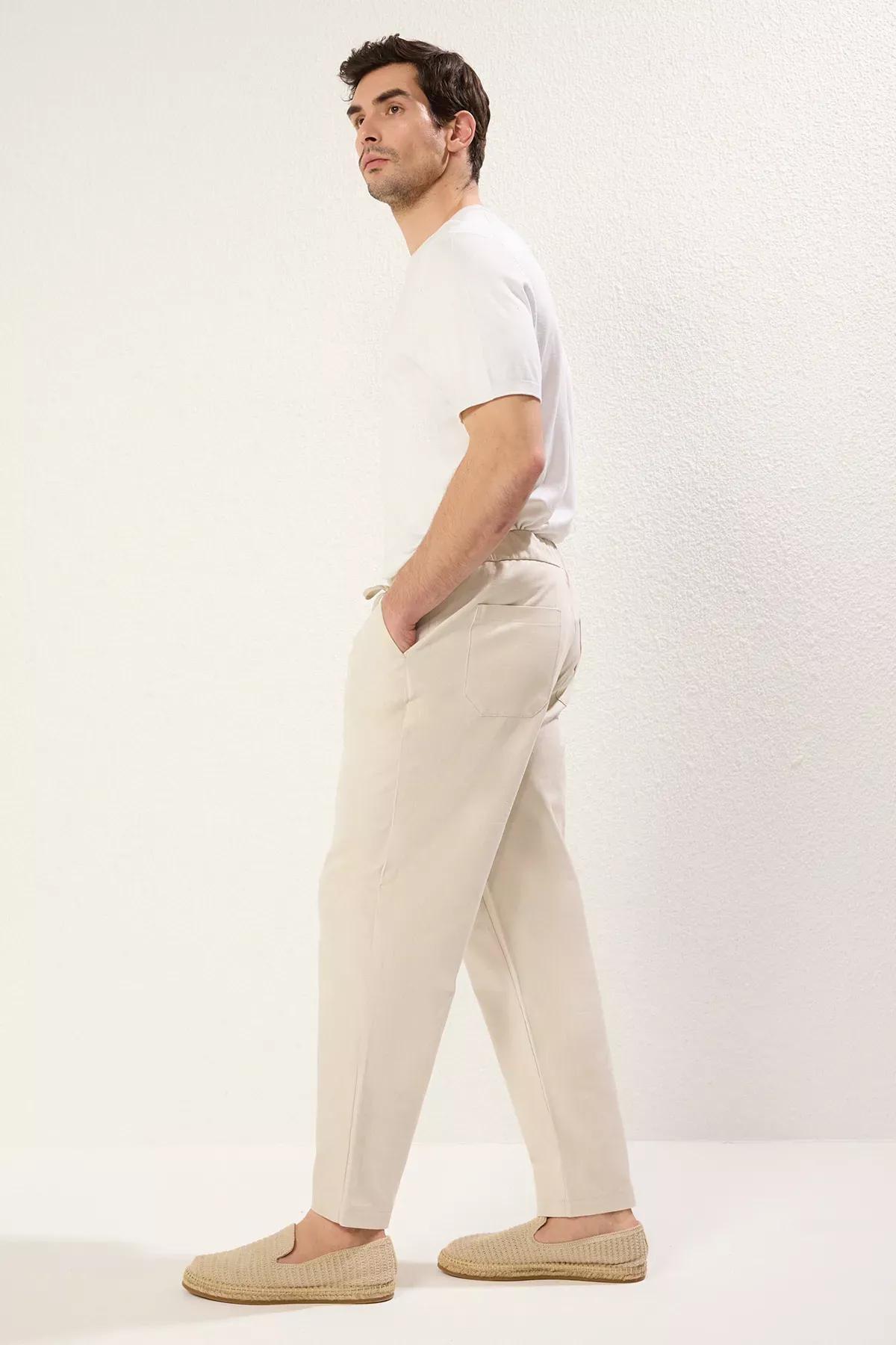 Beige Tapered Skinny Textured Trousers, , large image number 1